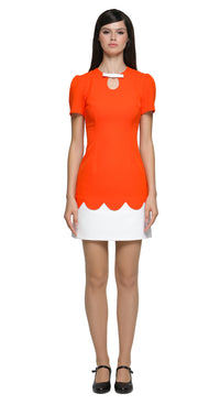 Achieve an easy to reach for stunning look with this fitted vibrant retro event dress, featuring subtle white bow detailing over a neckline cutout. The bold orange torso leads to beautifully crafted top-stitch finished scalloped detail, complemented by a short white skirt. This versatile piece suits heels for an elegant night out but also lends itself perfectly to flats and kicks for a more casual vibe.
Available in alternative sleeve and hem lengths, as well as a variety of colors, this dress is designed t
