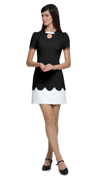 Achieve an easy to reach for stunning look with this fitted vibrant retro event dress, featuring subtle white bow detailing over a neckline cutout. The bold orange torso leads to beautifully crafted top-stitch finished scalloped detail, complemented by a short white skirt. This versatile piece suits heels for an elegant night out but also lends itself perfectly to flats and kicks for a more casual vibe.
Available in alternative sleeve and hem lengths, as well as a variety of colors, this dress is designed t