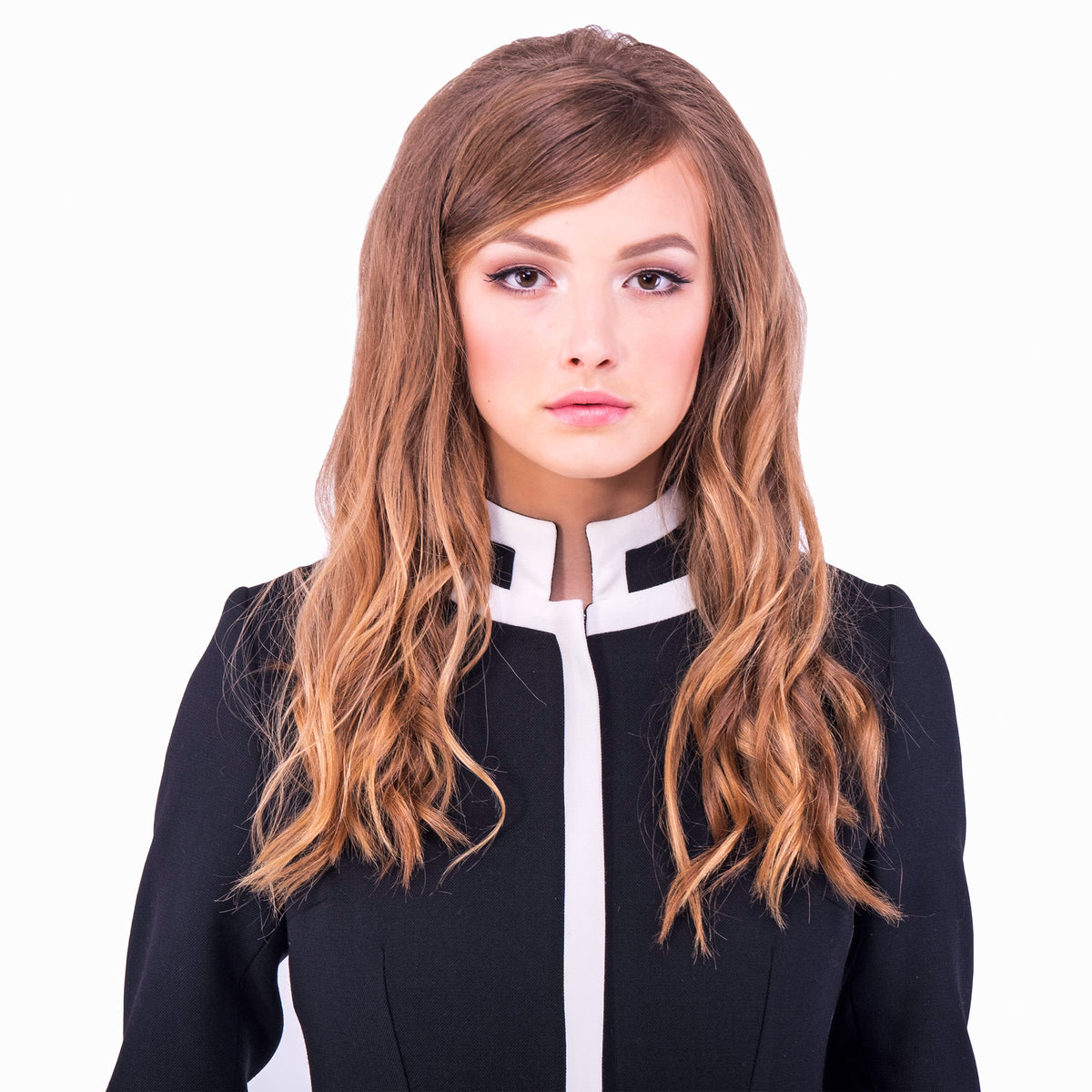 Elevate your autumn-winter style with our medium-weight Italian fair-weather coat. This black/light cream, sixties-inspired full-length coat seamlessly combines classic design with modern comfort; it’s perfect for various occasions. The standout feature is the very intricate geometric pocket detailing, adding a touch of drama to this elegant piece. Stay warm, stylish, and conversation-ready this season.