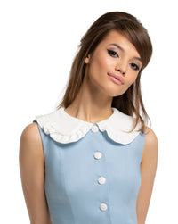 This charming fitted vintage inspired, Spring dress, made of a lovely high-quality Italian cotton, with a white ruffled collar, matching white belt and five button detailing provides an easy transition from work to play. Dusty blue, simple and elegant, dressed up or comfortably down, by way of shoes and accessories.  Choose bespoke to add capped sleeves or alternate colour scheme.