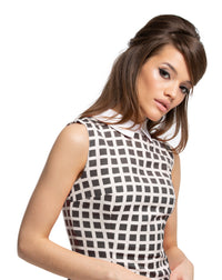 A simple a-line Spring dress. This cut takes on a dramatic, entrance making impression through the use of a muted red/light cream geometric pattern, of stunning quality French mill fabric. An elegant petite collar compliments the lines of the dress perfectly permiting an immediate sixties appearance.  Also available in a muted black/light cream fabric also pictured.  Pairs perfectly with the geometric pattern coat to complete a fantastic high fashion look.