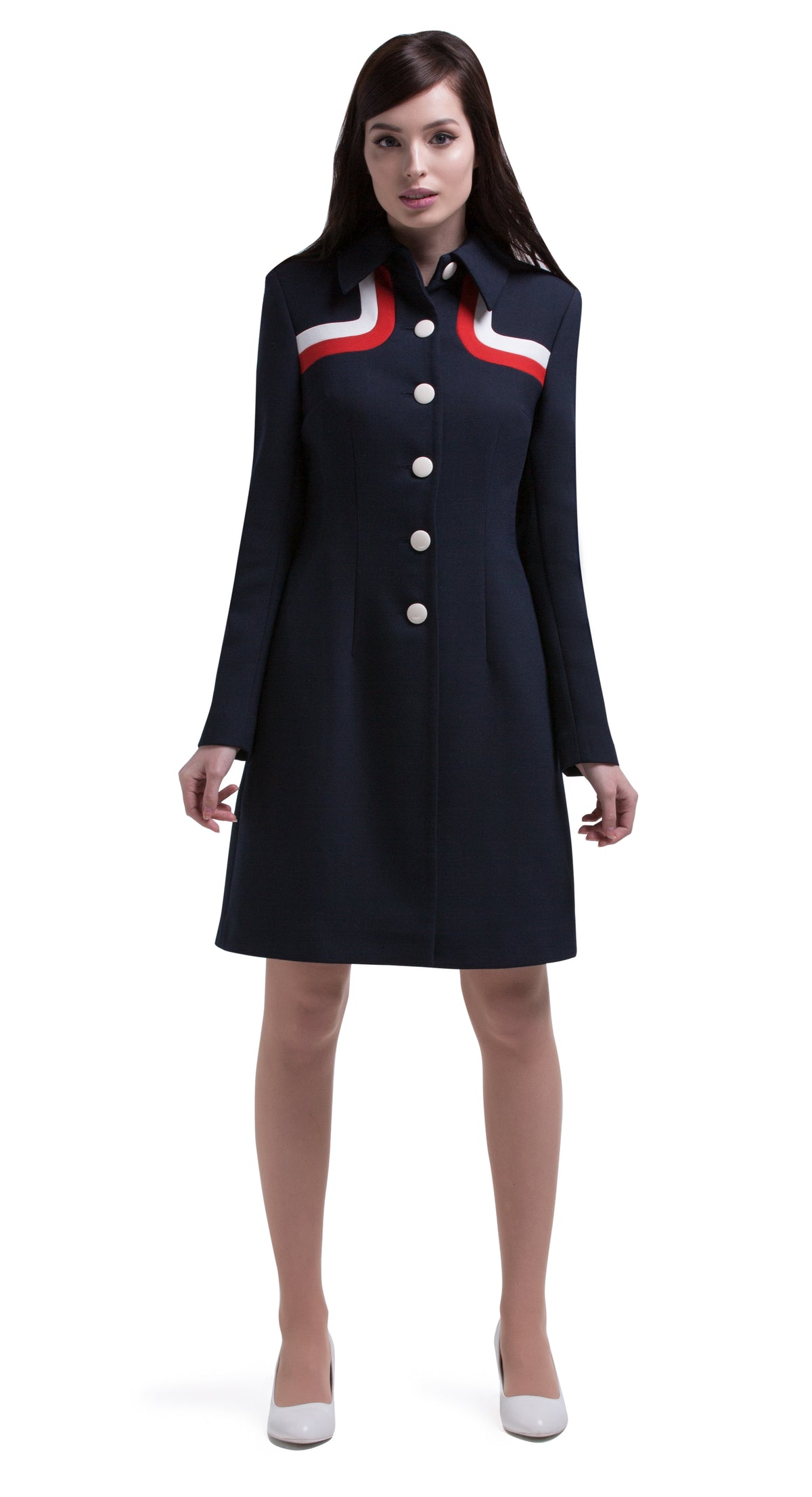 Another immediately sixties mod Autumn coat that allows for the timeless tri-colour of navy blue, red and light cream to produce a dramatic silhouette. A straight cut featuring a classic collar, fully lined Italian mill fabric, with functioning side pockets, animated white button front closure and a cool retro striped neckline.  An entrance maker over plain dresses within the tricolour colour range or paired perfectly with matching dress to complete this high fashion very wearable set.
