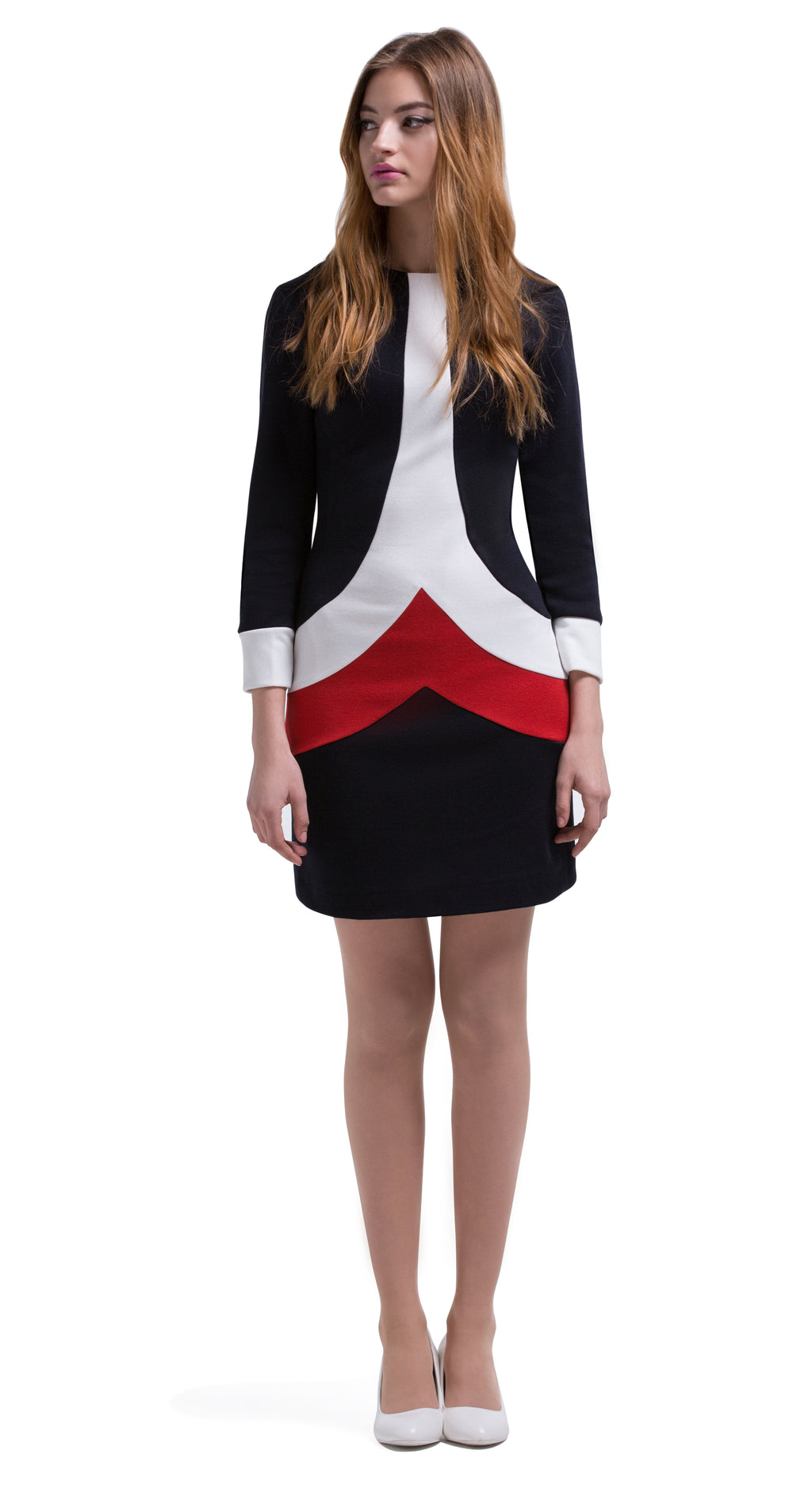 This Autumn, long sleeve Italian jersey straight cut dress delivers an immediate sixties retro impression through use of the chevron bodice panels creating a unique tric-olour stripe. Back zipper closure, full length sleeve with white cuff detailing. Generous stretch within the jersey; a comfortable dress without surrendering impacting style.