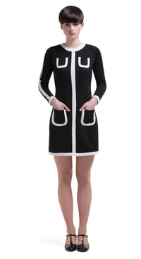 This straight cut, undeniably cool retro dress is made of an Italian jersey. A light cream rounded neckline leads into a bodice stripe dividing four perfectly placed functioning pockets. Full length sleeve with a complimenting light cream stripe and cream band cuff.  Generous stretch within the medium weight jersey. This versatile and flattering style can be dressed up by accessorizing or toned down with comfy kicks for both at-work and play.