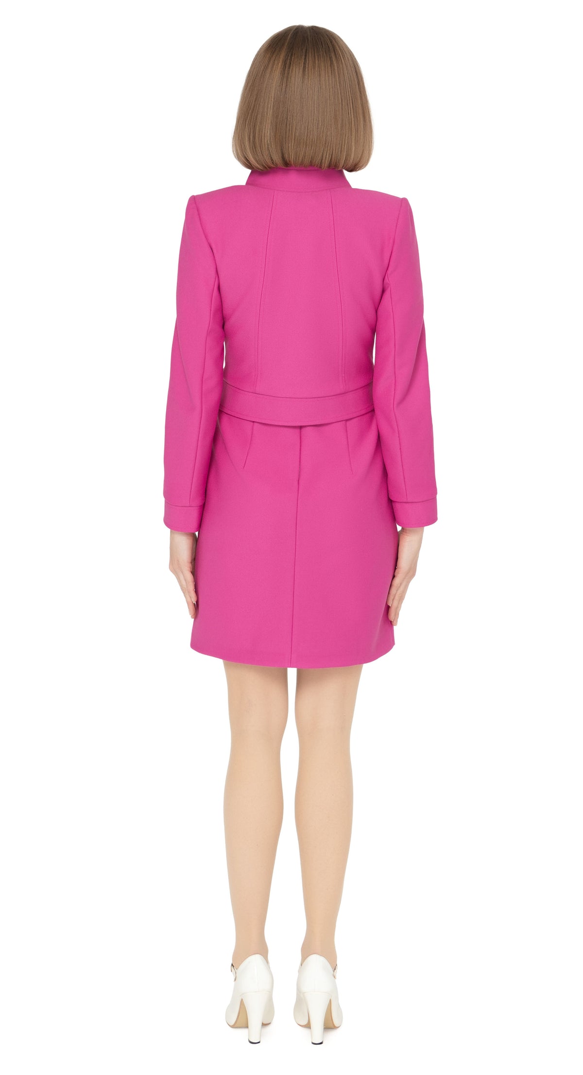 Our bold fitted fuchsia jacket is a statement piece that announces arrival. The stunningly tailored aesthetic of this jacket is immediately visible within the collar design and retro offset looped front zipper closure. Our seasoned pattern makers have outdone themselves with this superb example of a modern, cool aesthetic. 