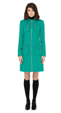 Impeccably crafted sixties style fitted, fair weather coat in a strikingly unique Italian wool blend. Fully lined with a detachable black faux fur collar and dramatic detachable cuffs. Retro loop zip front closure and four zip-up essentials pockets.  Pairs perfectly with our 1960s Style Skirt with Retro Loop Zipper Pull to create an as-intended high fashion set for all occasions.   Indistinguishable cruelty-free faux fur detailing attaches and removes simply to add versatility to the coat across seasons.