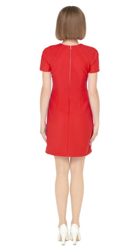 Our stunning fitted sixties dress in knock ‘em dead red. Functional front pockets keeping your hands free and matching retro loop zip shoulder detailing for attentive to style continuity. The short sleeves and rounded neck provide a comfortable and flattering fit.