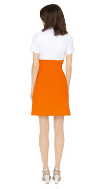 Vintage sport inspired dress; casual, cool and immediately spring. This fitted, slightly A-line dress features a classic oversized 70s style collar and imaginative contrasting paneling across the torso and neckline, giving it a modern twist on European sports styles of the sixties and seventies. The retro looped zipper front closure and short sleeves add to its vintage charm.