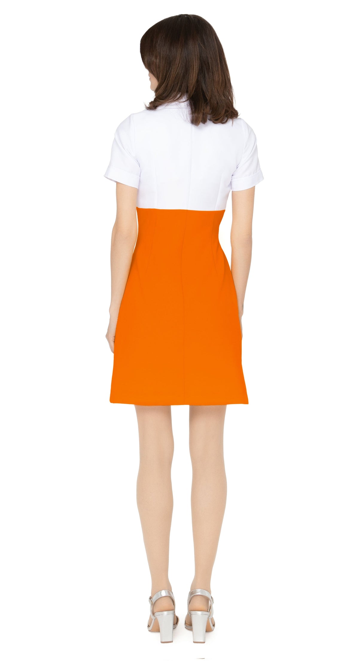 Vintage sport inspired dress, Casual, cool and immediately spring. This fitted, slightly A-line dress features a classic oversized 70s style collar and imaginative contrasting paneling across the skirting, torso, and neckline, giving it a modern twist on European sports styles of the sixties and seventies. The retro looped zipper front closure and short sleeves add to its vintage charm.