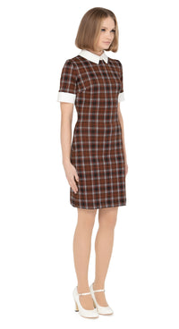 Brown seventies style plaid Italian jersey dress with short sleeves and white collar and cuffs. A comfortable, work-or-play, dressed up or down closet go-to.  Choose bespoke to choose sleeve or hem lengths to suit personal preference.  Unsure of your size? Use our chat feature.