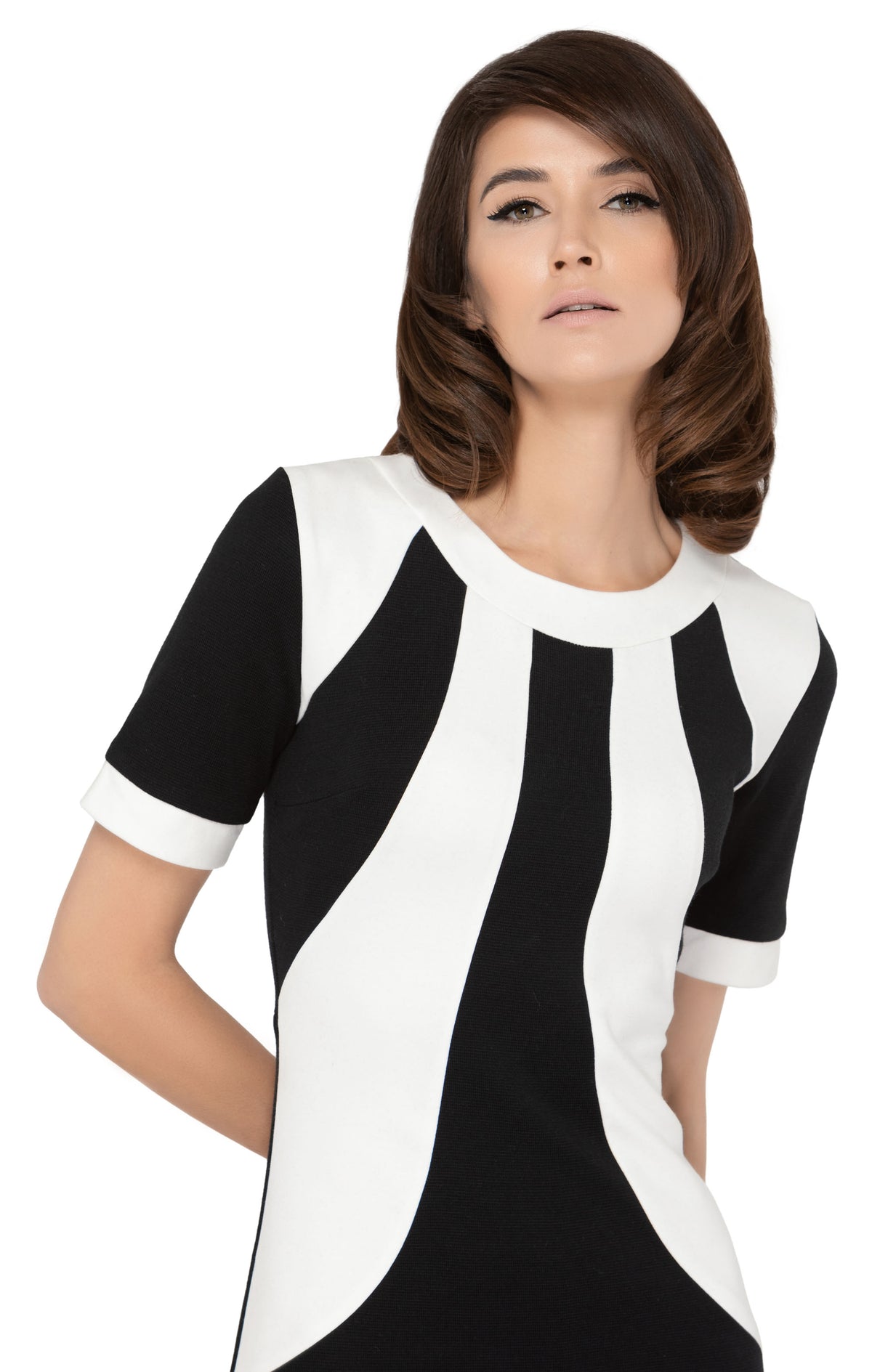 Italian medium-weight fitted wool jersey two tone dress with dramatic Atari detailing across the front torso. Detailing with a classic trim neckline and short sleeves.  Choose bespoke to alternate sleeve and hem length.