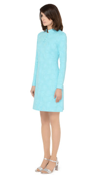 Stunning sixties Italian turquoise jersey, big night out dress with discreet hints of silver threading throughout the textured fabric. Mandarin collar with four buttons detailing as well as two button cuff detailing.   Choose bespoke for short or mid-length sleeves or for an alternate hem length such as a mini.