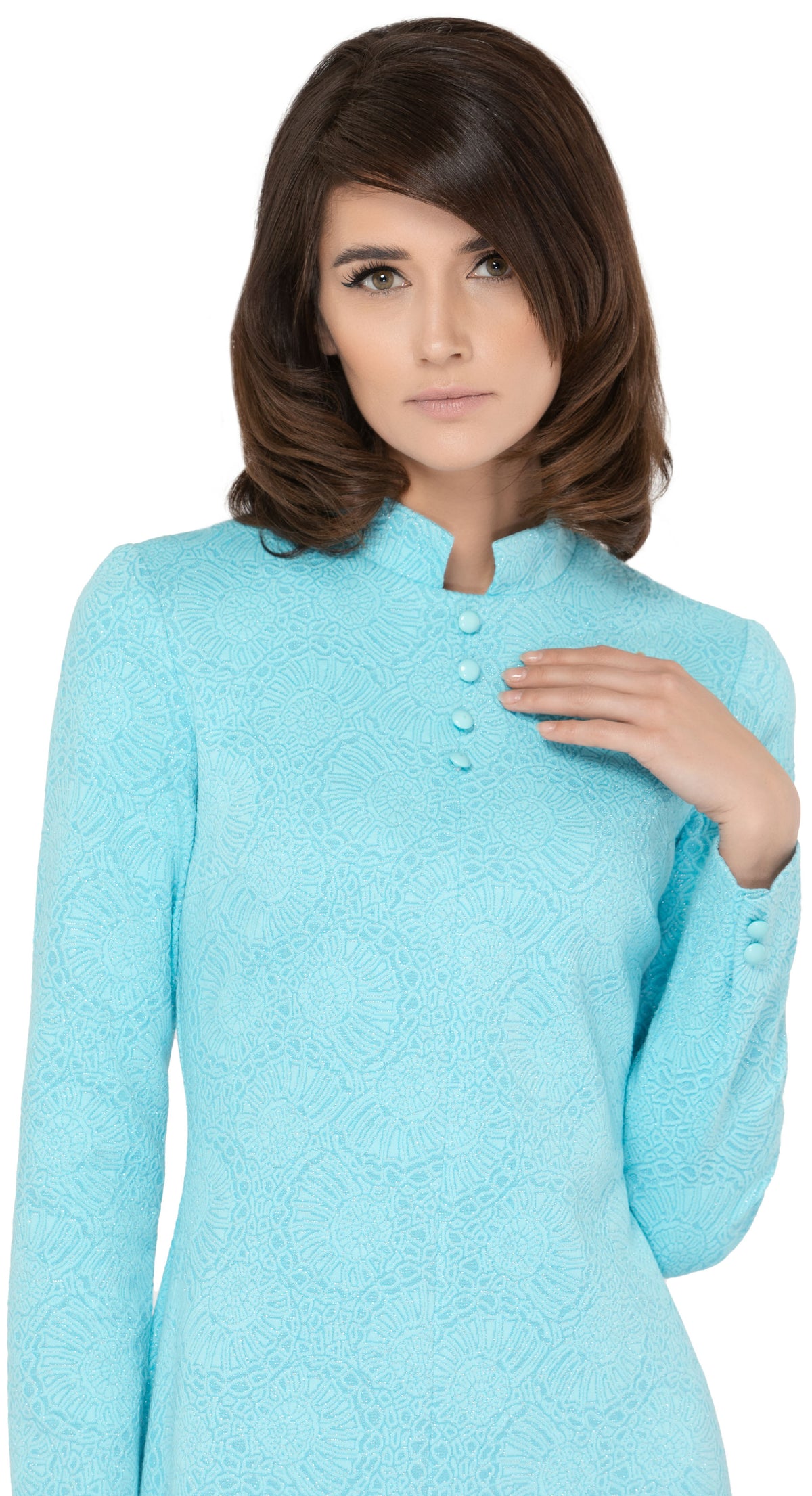 Stunning sixties Italian turquoise jersey, big night out dress with discreet hints of silver threading throughout the textured fabric. Mandarin collar with four buttons detailing as well as two button cuff detailing.   Choose bespoke for short or mid-length sleeves or for an alternate hem length such as a mini.