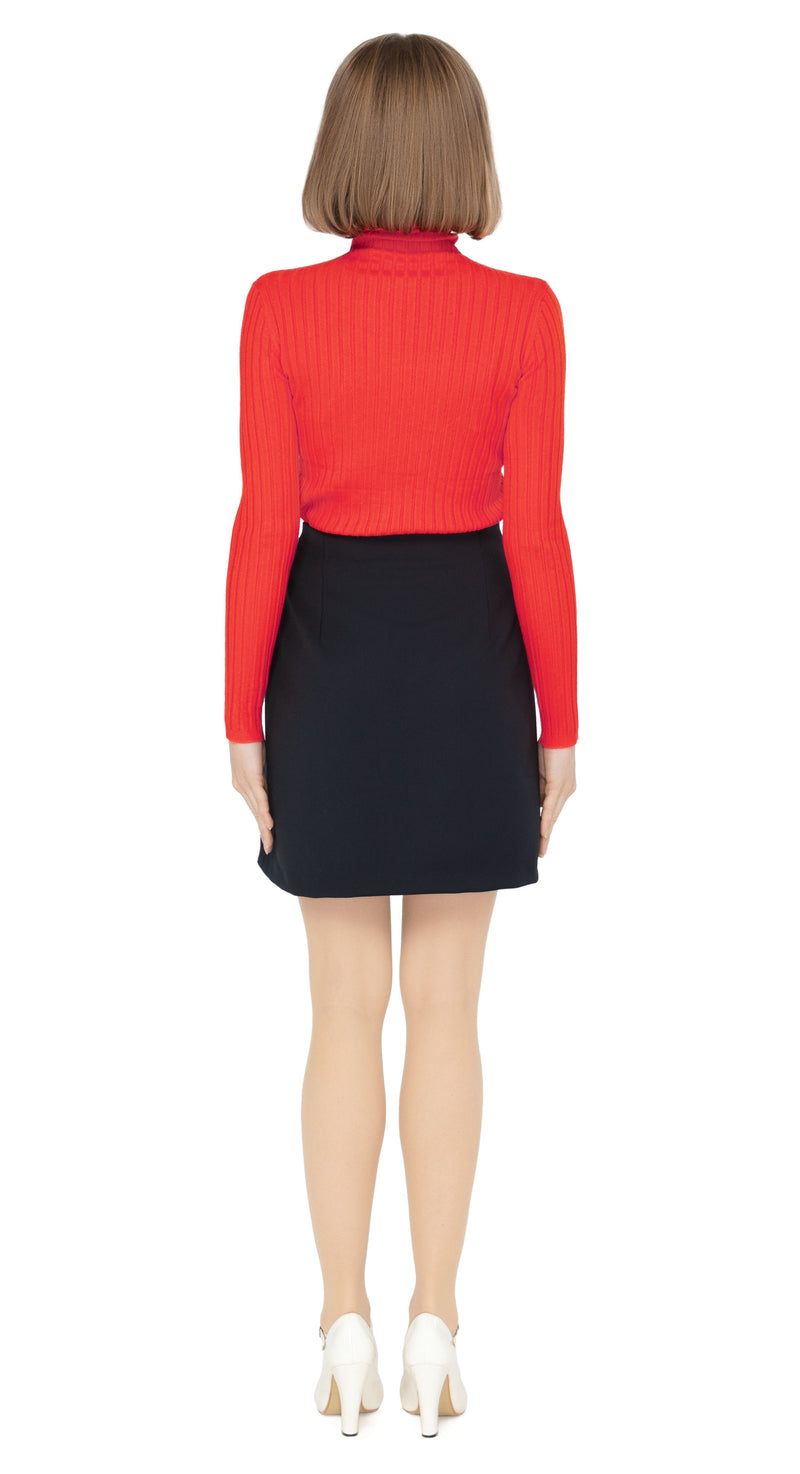 Complete the look with a mini that is the perfect complement to both jacket and coat with stripes from our Spring 23 collection, mirroring the designs perfectly. The skirt features the same intricate two-color detailing that creates a cohesive and elegant look.