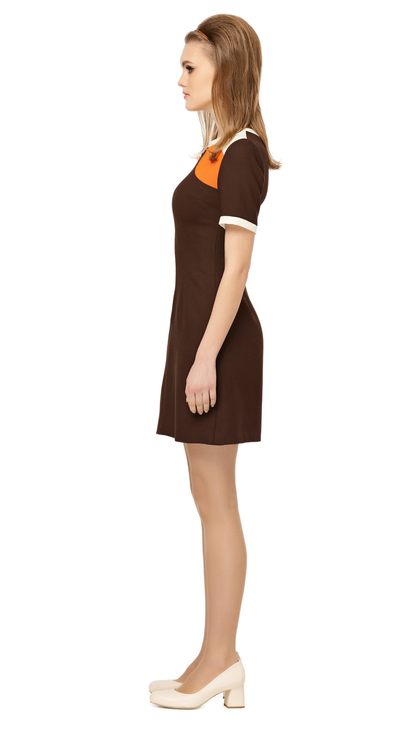 Fitted, fair weather dress, drawing on a retro sport feel & blending the style into a high fashion and very wearable Spring look.  The versatility of this style encourages this as a go-to for both day or night, office or event. A premium Spanish wool blend fabric, retro looped front zip closure, short sleeves and rounded neckline.  Choose bespoke to alternate sleeve and/or hem length.  Pairs perfectly as intended with our retro styled cropped Spring jacket.