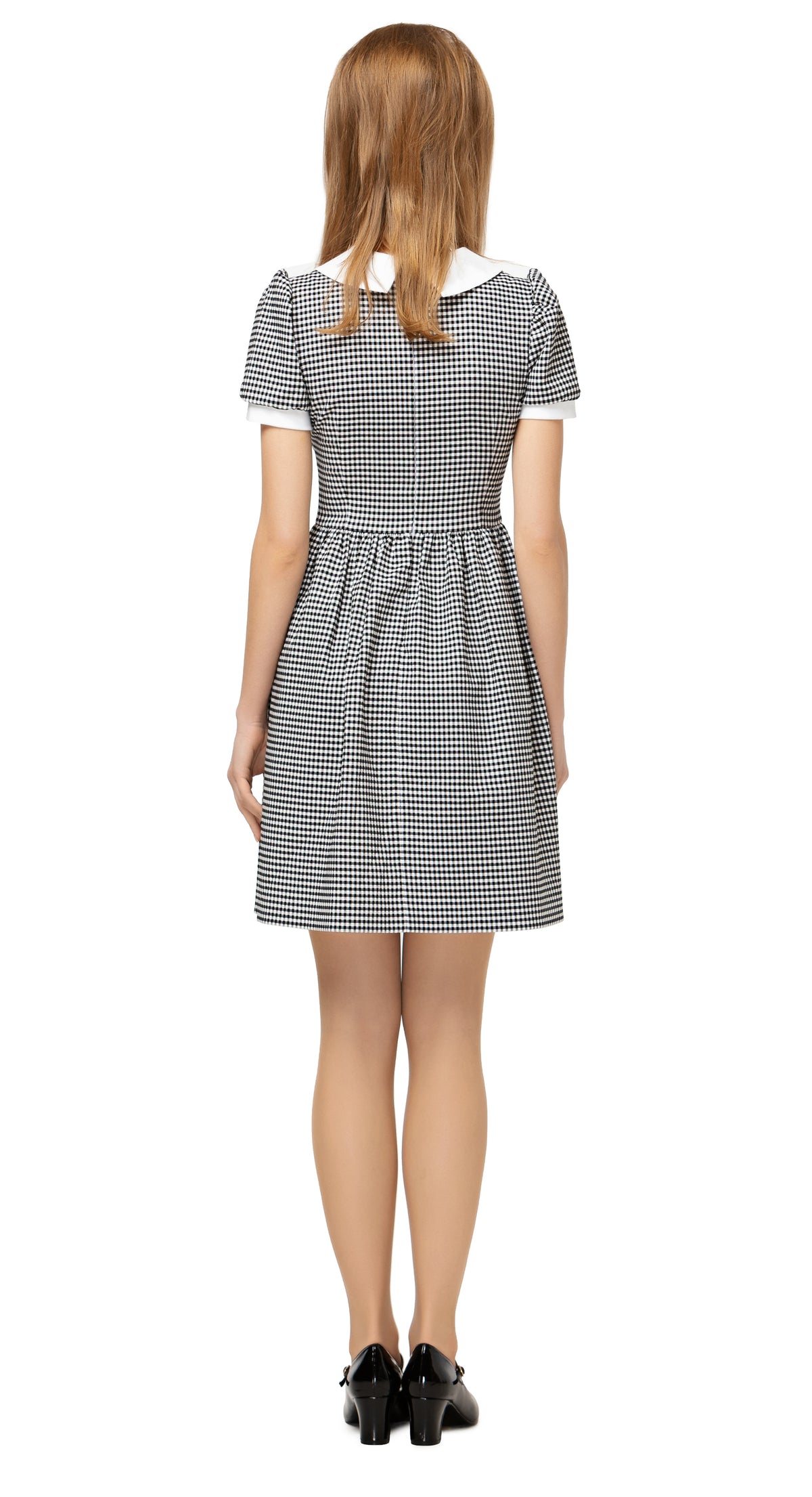 Gingham Spring dress with fitted bodice and gathered skirt. Made of premium quality Italian cotton, with slightly puffed sleeves, four button detailing and classic collar. A casual, effortlessly  comfortable and cool fair weather go-to.