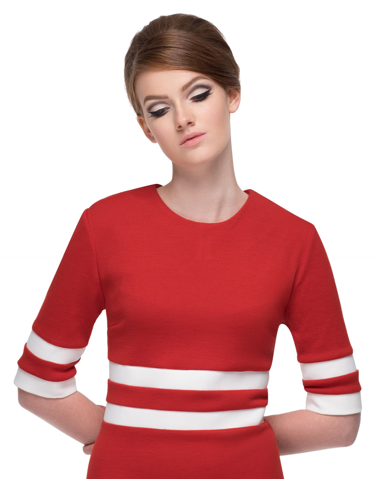 This at work or at play red Italian medium weight jersey, sixties style dress is broken up by two contrasting white stripes on the waist and on the sleeves. A very flattering quality jersey provides a generous give to compliment any silhouette. Also available in black/white.